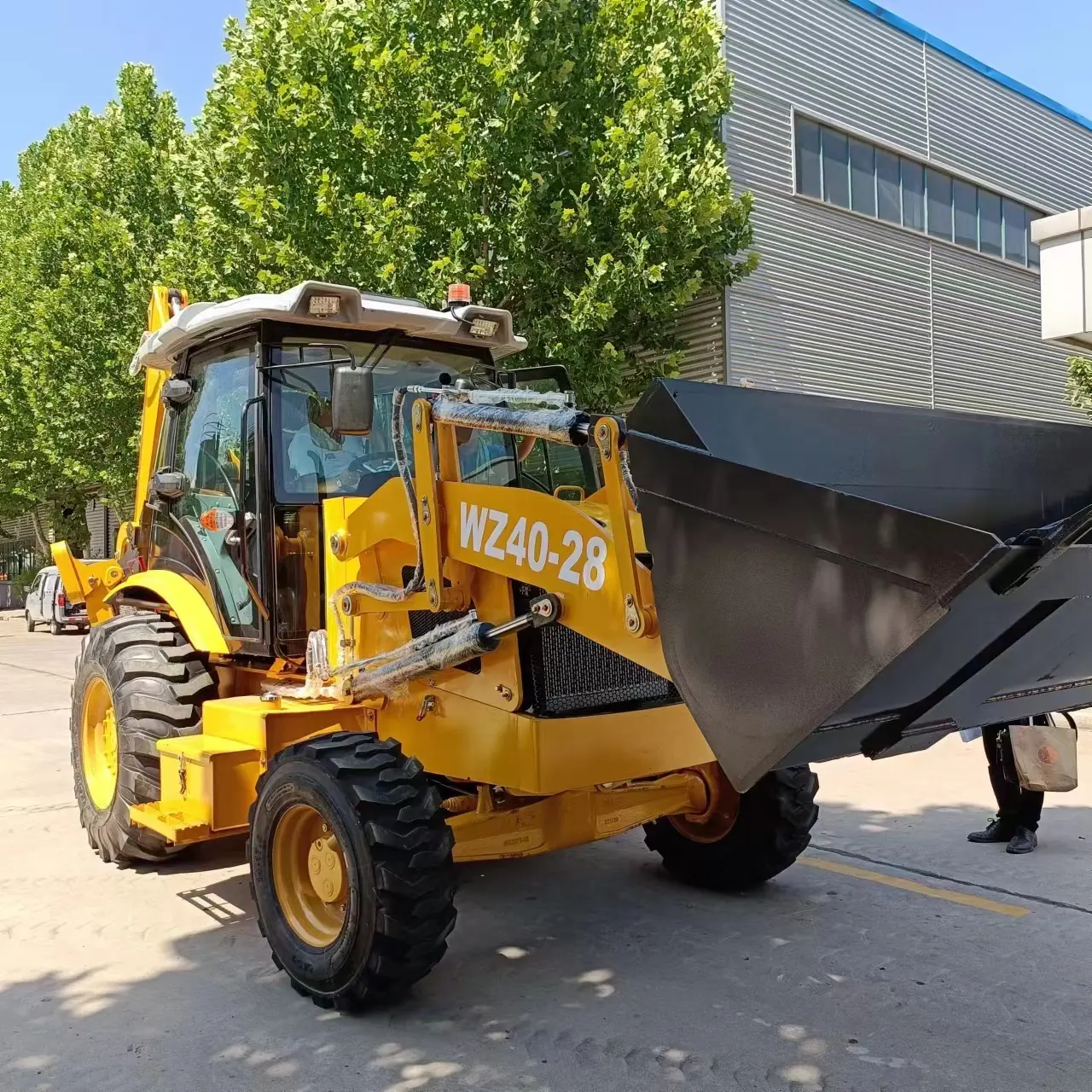 Mesin pemindah bumi peralatan berat WZ40-28 Backhoe Loader roda penggerak 4 roda