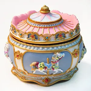 מפעל סיטונאי polyresin צלמית קרוסלת music box