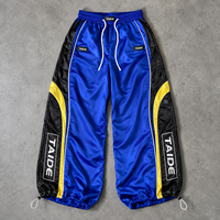Pantalon de survêtement en satin TaiDe certifié BSCI, avec empiècements latéraux color block, coupe ample et large, taille ajustée, logo personnalisé, OEM ODM, vente en gros