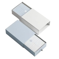 Boîte cadeau en carton écologique de type tiroir avec lamination mate et gaufrage pour l'emballage de sous-vêtements et de chaussettes