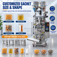 Machine d'emballage DEEPACK pour recettes de pop-corn avec alimentation en granulés et liquides pour essais d'emballage sous film d'ingrédients combinés