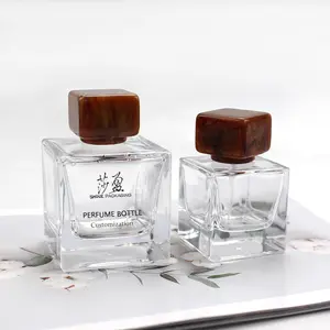 Produk baru botol parfum kosong mewah 50 ml 100ml botol semprot kabut parfum kaca persegi dengan tutup persegi
