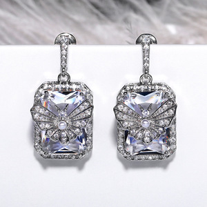 Orecchini pendenti da donna classici in rame placcato oro bianco con fiocco e zirconi, gioielli alla moda - Product Image 4