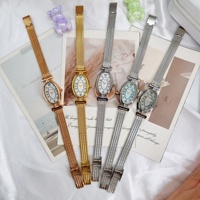 Montre à quartz pour femme de luxe, nouvelle, de forme ovale, bracelet en acrylique, cadran en nacre, chiffres arabes, écologique, 30 mm, vintage