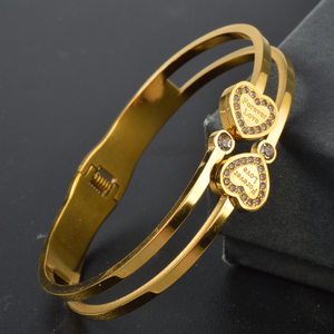 Trendy sleek personnalisé bulk radiant zircon encrusted dual‑heart <b>engraved</b> 18k gold plated stainless steel <b>bangle</b> bracelet - Product Image 1