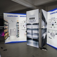 Boîte lumineuse SEG personnalisée pour stand d'exposition d'angle avec grandes ouvertures pour salon professionnel