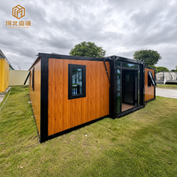 Maison Modulaire Moderne Personnalisable 20, 30 ou 40 pieds, Aménagement 1 à 4 Chambres avec Entrée Centrale en Verre, Maison Conteneur Résidentielle