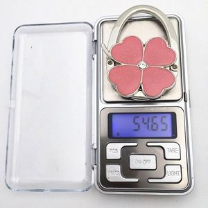 Soporte Plegable para Bolsos con Diseño de Trébol, Hecho a Mano en Metal, para Mesa, Portátil, se Coloca en Casi Cualquier Lugar - Product Image 5