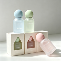 Vente de flacons de parfum vides en verre de 30 ml, 50 ml, 100 ml, forme cylindrique ronde, style estival coloré, flacon de parfum personnalisé avec logo et couleur