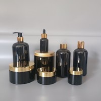 Bouteilles d'emballage et pot de couleur noire en plastique de luxe de 10ml à 1000ml pour la croissance des cheveux