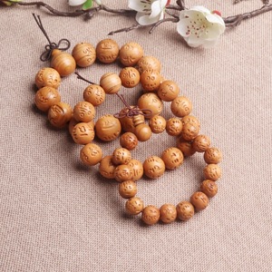 Pulsera de Madera de Durazno con Grabado de Mantra de Seis Sílabas, Joyería Religiosa Unisex, Origen Shandong, Coleccionable Cultural - Product Image 1