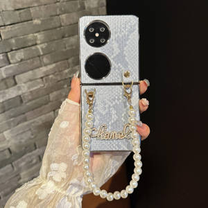 Nuevos diseños Patrón de serpiente Funda para teléfono móvil con correa de cadena de perlas para <span class=keywords><strong>Huawei</strong></span> <span class=keywords><strong>P50</strong></span> <span class=keywords><strong>Pocket</strong></span> S para Samsung Z Flip 4 5 6 W24 - Product Image 1