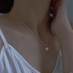 Collar de Plata de Ley S925 Simple y Versátil con Colgante de Perla Ovalada, Diseño de Nicho para Mujer, Longitud a la Clavícula - Product Image 2