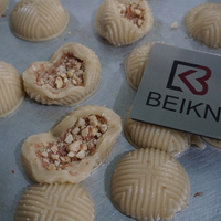 Machine de fabrication de biscuits remplis Machine à encroûter les biscuits Maamoul Dates Machine à encroûter les gâteaux de lune commerciale entièrement automatique