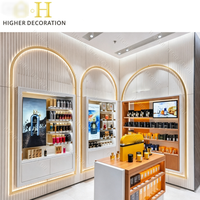 Kiosque d'exposition de parfums rétroéclairé sur mesure avec étagères en verre, vitrine de vente au détail pour boutique de centre commercial