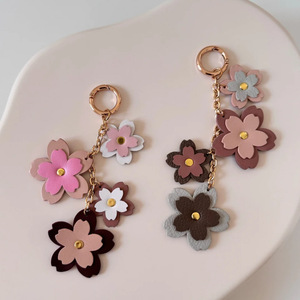 Stylish cherry blossom patchwork flower pendant, PU <b>leather</b> chain pendant, trendy color-blocked bag accessory <b>keychain</b> - Product Image 1