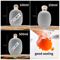 Bouteilles en verre givré rondes vides de haute qualité de 100 ml, 250 ml, 500 ml pour jus, vin et autres boissons, idéales pour l'emballage de vin de fruits
