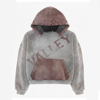 Sweat à capuche gris-brun à empiècements contrastants, délavage vintage, imprimé graphique, détails bords effilochés, style streetwear, fournisseur en vogue