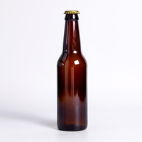 Vente en gros Bouteille de bière en verre transparent vide bon marché 330ml 33cl 12oz de soda ou de jus