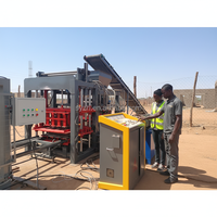 Machine automatique de fabrication de blocs de ciment QT4-15 JS500 6000 kg 15s Haute efficacité