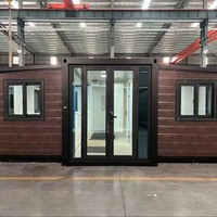 Casa Contenedor Prefabricada Expandible de Dos Pisos, Diseño Contemporáneo, Pequeña, Independiente, con Estructura de Acero, para Jardín