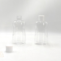 Bouteille d'huile essentielle plate et ronde en plastique, couleur et étiquette personnalisées, avec bouchon à clapet, pour massage