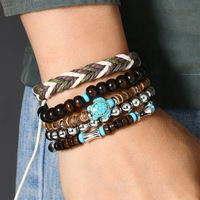 Bracelet rétro DIY multi-couches en fil élastique avec perles en bois et coquille de noix de coco, idéal pour les rendez-vous, les fêtes et les cadeaux.