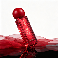 Vente en gros d'usine, flacon de parfum en verre transparent rectangulaire carré rouge élégant haut de gamme de 30 ml avec bouchon sphérique et impression sérigraphiée