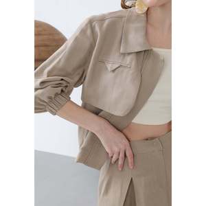 Ensemble jupe zippée élégante en viscose/polyester respirant et doux pour femme Puane, avec patte de boutonnage discrète et tissu fluide pour un confort tout au long de la journée - Product Image 2