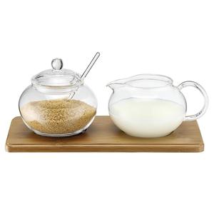 Ensemble sucrier et crémier en verre avec couvercle et cuillère sur plateau en bois - Product Image 1