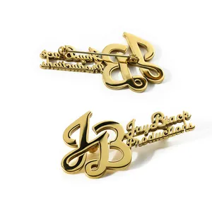 Hesank Factory supplier custom metal stainless steel cut with shiny gold logo monogram brooch/brooch