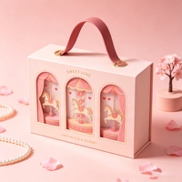 Boîte cadeau en papier kraft rose de luxe en gros avec doublure en éponge et poignée pour l'emballage de parfums, cosmétiques et bijoux
