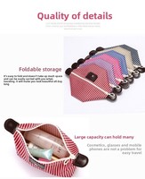 Trousse de maquillage de luxe OEM en nylon écologique personnalisée noire avec logo brodé fermeture à glissière pochette de voyage cosmétique professionnelle
