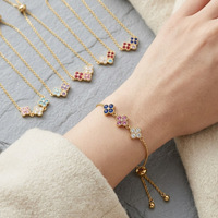 Nouveau bracelet de luxe haut de gamme incrusté de diamants, trèfle à quatre feuilles, pétales de fleurs, en acier inoxydable électroplaqué pour femme