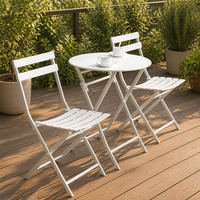Ensemble table et chaises pliantes trois pièces en fer forgé, style américain moderne et minimaliste, pour l'extérieur et les cafés