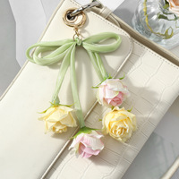 Groothandel handgemaakte kleine boeketjes bloemen met strikbandjes satijn zijden bloemen lint eeuwige rozen sleutelhanger tas telefoonhanger
