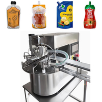 Machine de remplissage et d'emballage de sachets à bec automatique Machine rotative de bureau pour le remplissage et le capsulage de sachets à bec verseur pour jus de boisson liquide