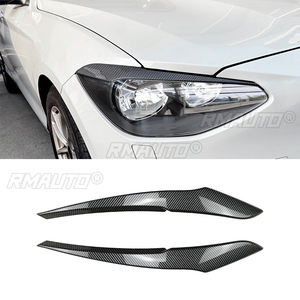 Pegatinas para Cejas de Faros Delanteros de Coche, Aspecto Negro Brillante/Carbono, para BMW Serie 1 F20 F21 2011-2014 - Product Image 1