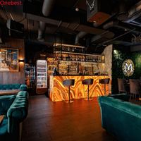Comptoir en pierre artificielle noire avec éclairage LED, comptoirs de présentation de café en onyx, design luxueux, comptoir de bar chinois