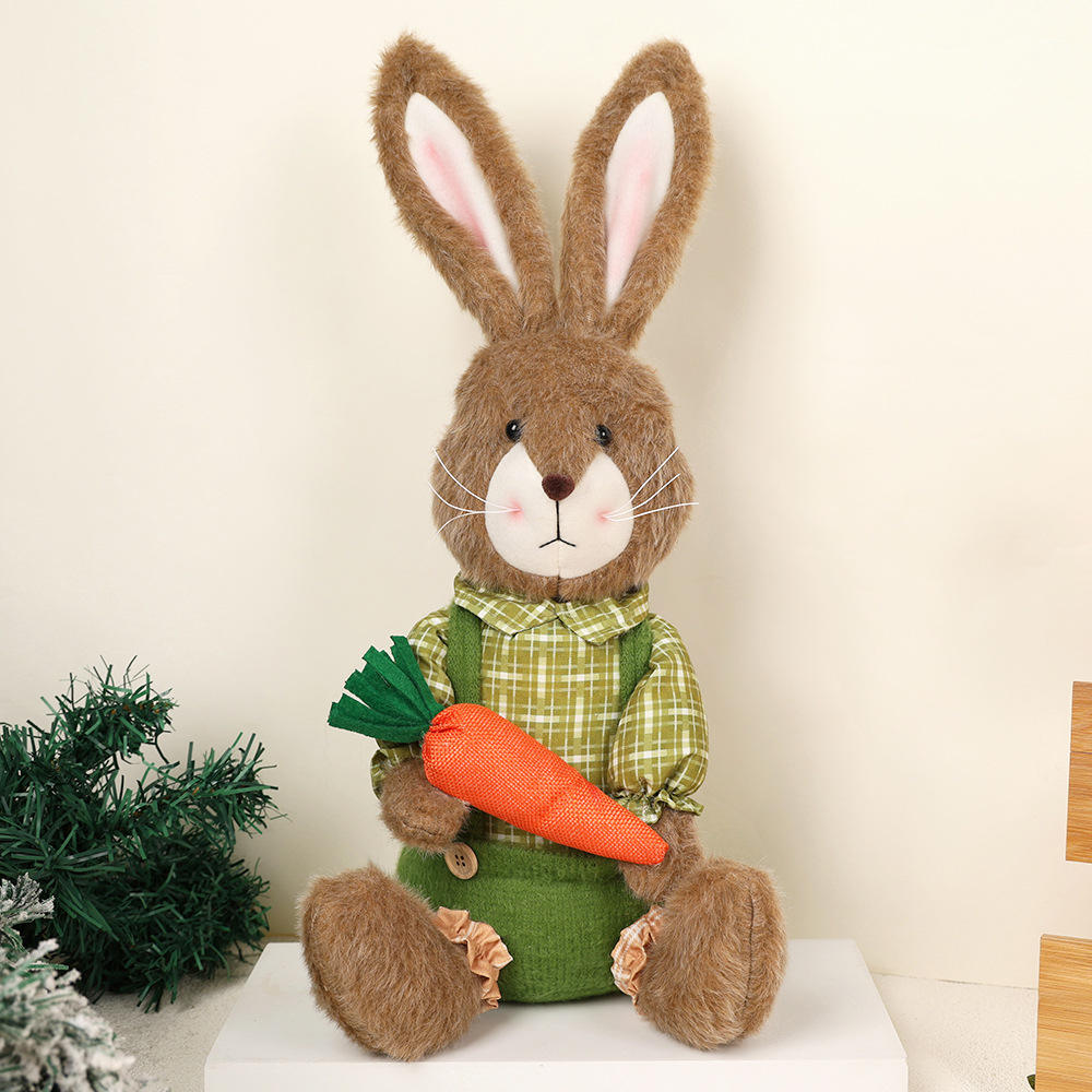 Green rabbit sitting with carrot