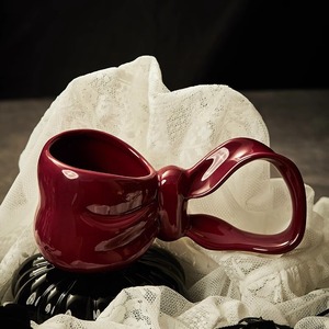 <span class=keywords><strong>Tasse</strong></span> à eau en céramique à long manche avec nœud créatif, <span class=keywords><strong>tasse</strong></span> à café haut de gamme, cadeau pour les amies, design classique pour les fêtes - Product Image 3