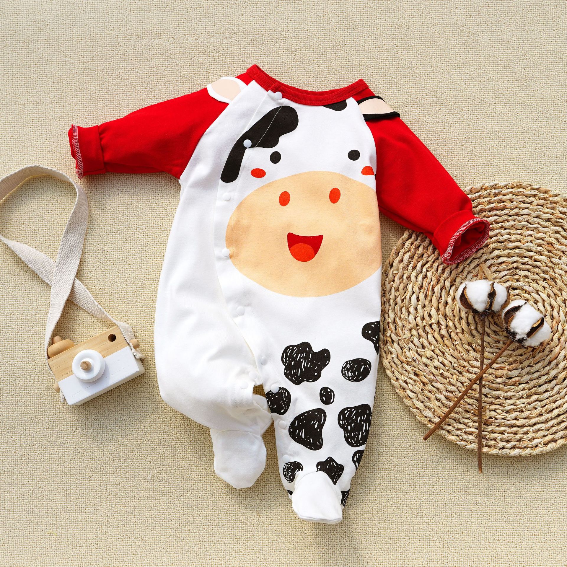 Vache à manches rouges