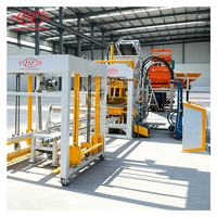 Machine économique pour la fabrication de blocs de béton emboîtables QT6-15D pour petits investisseurs souhaitant créer une petite usine de briques de ciment emboîtables.