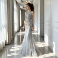 Robe de soirée sirène argentée sans manches, ornée de perles et de strass faits à la main, en dentelle et tulle, longue, pour bal de promo, mariage ou fête, avec traîne naturelle