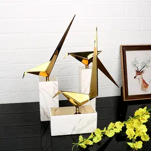 Modern home decor stainless steel bird shape home decoration with white marble base