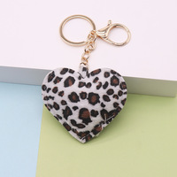Nouveau porte-clés en cuir imprimé léopard de style européen et américain, pendentif de voiture en forme de cœur, breloque de sac, petits cadeaux