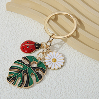 Porte-clés mousqueton mignon bijoux faits main Eanmel avec de belles fleurs d'insectes et de grandes feuilles pour femmes hommes cadeaux d'amitié