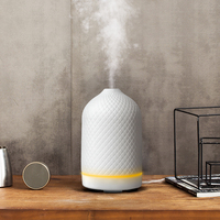Diffuseur d'huiles essentielles et humidificateur d'air électrique ultrasonique de table 100 ml en céramique écologique pour hôtels, en promotion, garantie 1 an