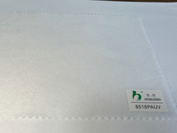 Tissu d'interlining non tissé sans UV PES/PA Microdot sans poudre fluorescente pour la confection de vêtements