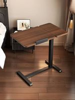 Support d'ordinateur portable pliable moderne avec plateau réglable en hauteur pour utilisation sur lit, canapé ou au sol, design tour